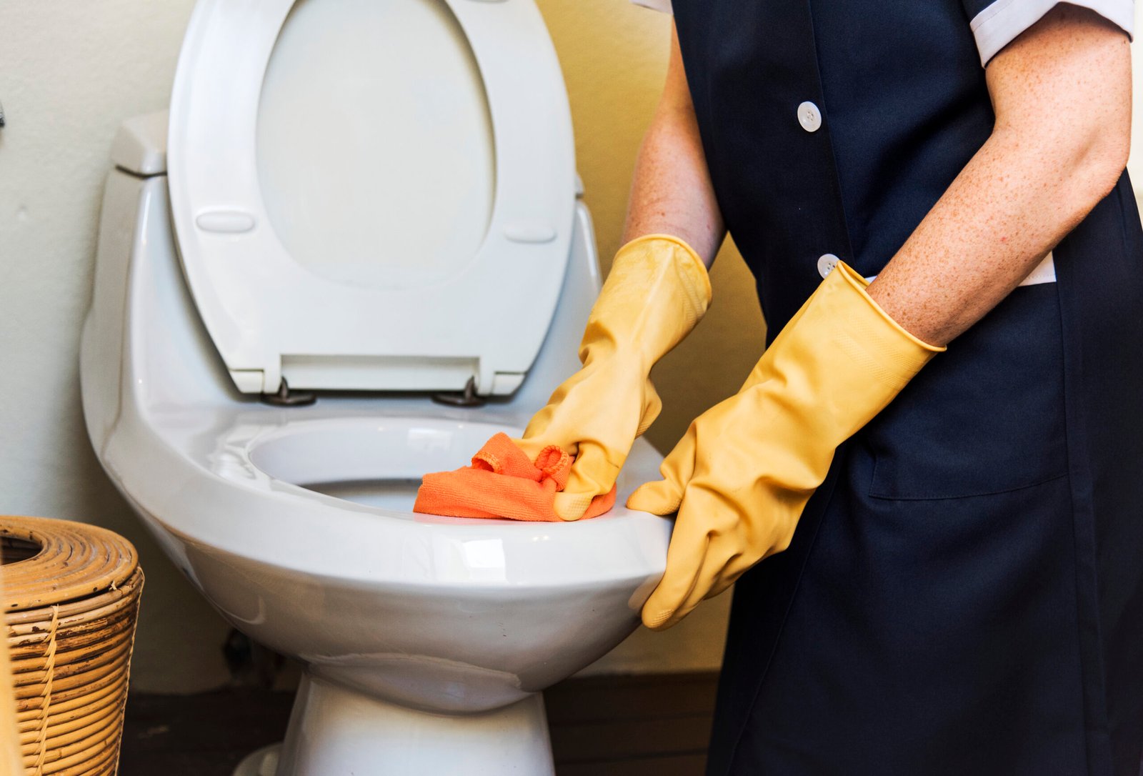 Home housekeeper cleaning a hotel room